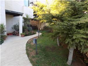 duplex semi Furnished 4 BR Ground floor with a garden dier ghabar area 